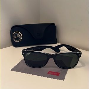 Ray-Ban “New Wayfarer Classic” Sunglasses with Matte Black on Clear Frames